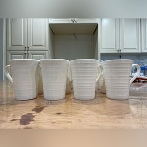 12 Set of Mikasa bone china white mugs in 2 patterns: Swirl and Polka dot